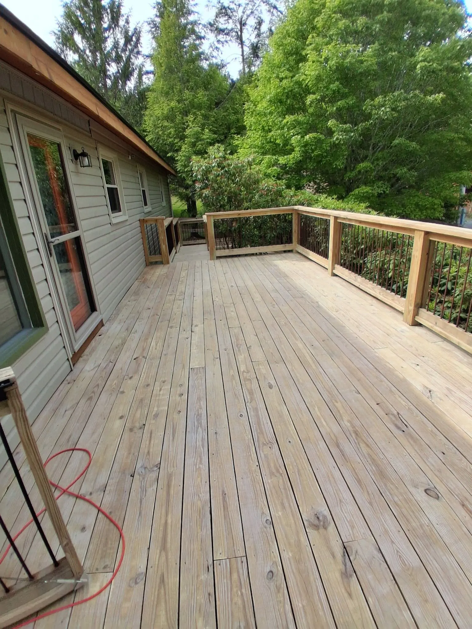 New unstained deck construction before staining on a mountain home