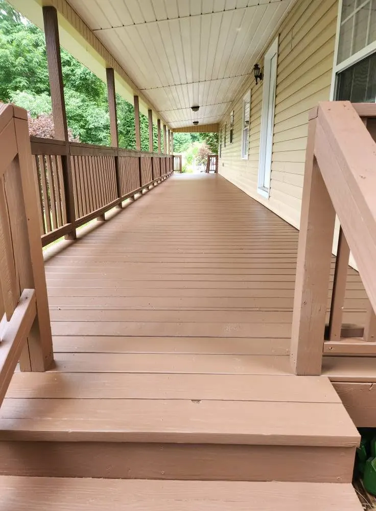 Freshly repainted deck and walkway on a Western North Carolina home